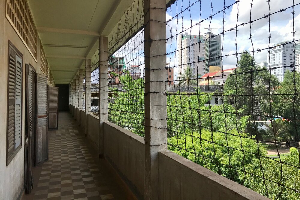 Barbed wire on upper floors of prisoner cell blocks