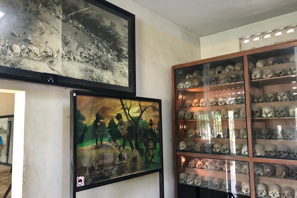 Pictures, scenes, and skulls from Choeung Ek Killing Fields; you can see the fractures on the skulls resulting from the brutal execution methods by blunt trauma (e.g., pickaxes) that the Khmer Rouge employed