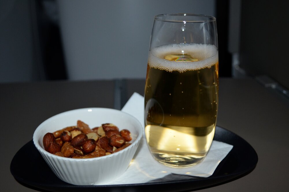 British Airways 787 business class – Champagne and warm nuts