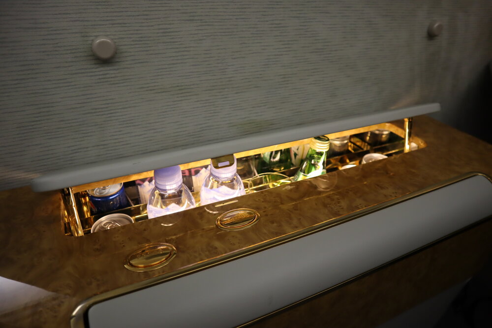 Emirates A380 First Class – Drinks cabinet being lowered