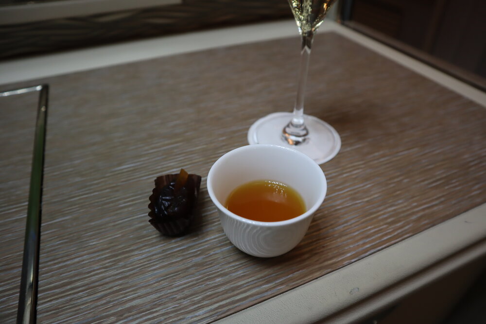 Emirates 777 New First Class – Arabic coffee and dates