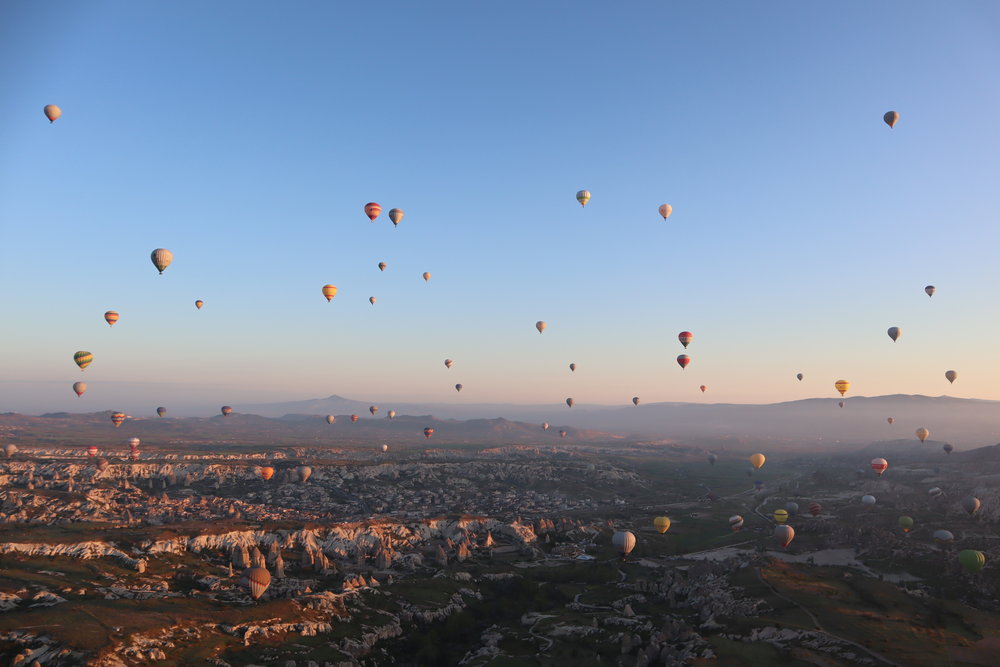 Hot air balloon ride at sunrise