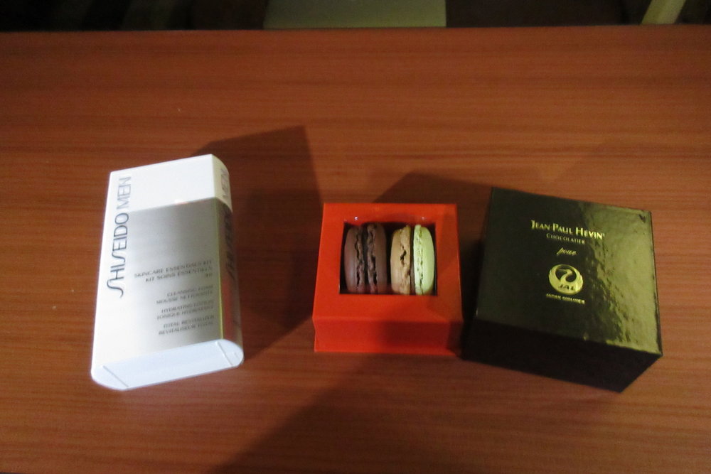 Japan Airlines First Class – Shiseido men's skincare kit and Jean-Paul Hévin macarons