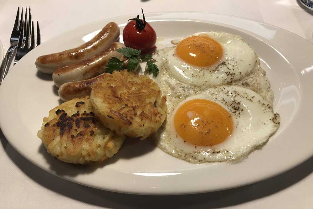 Swiss First Class Lounge Zurich – Rösti with eggs and sausages