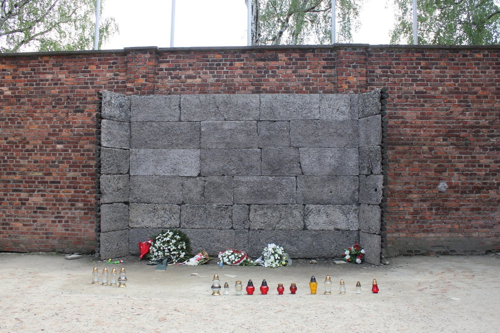 The infamous "death wall" at the notorious Block 11 of Auschwitz I, where thousands of prisoners were executed