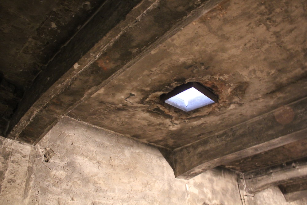 The hatch in Krema I through which canisters of Zyklon B were dropped